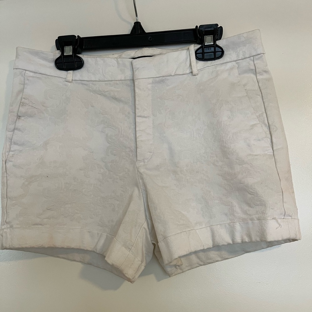 White shirt with white textured patterns